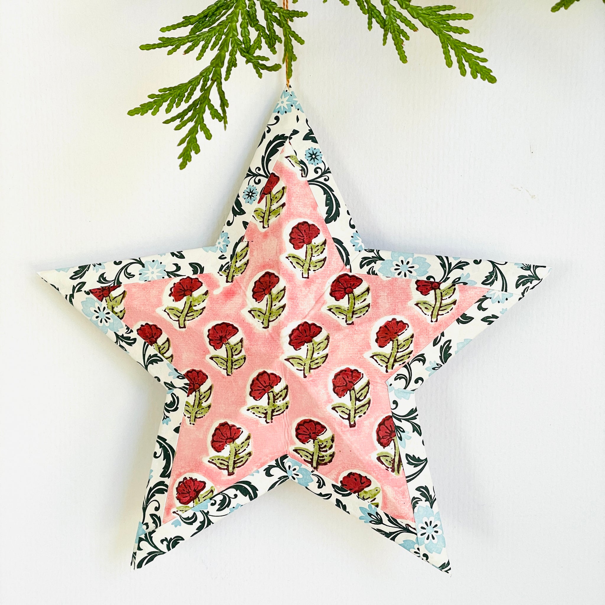 Hanging star in pink block print/blue floral