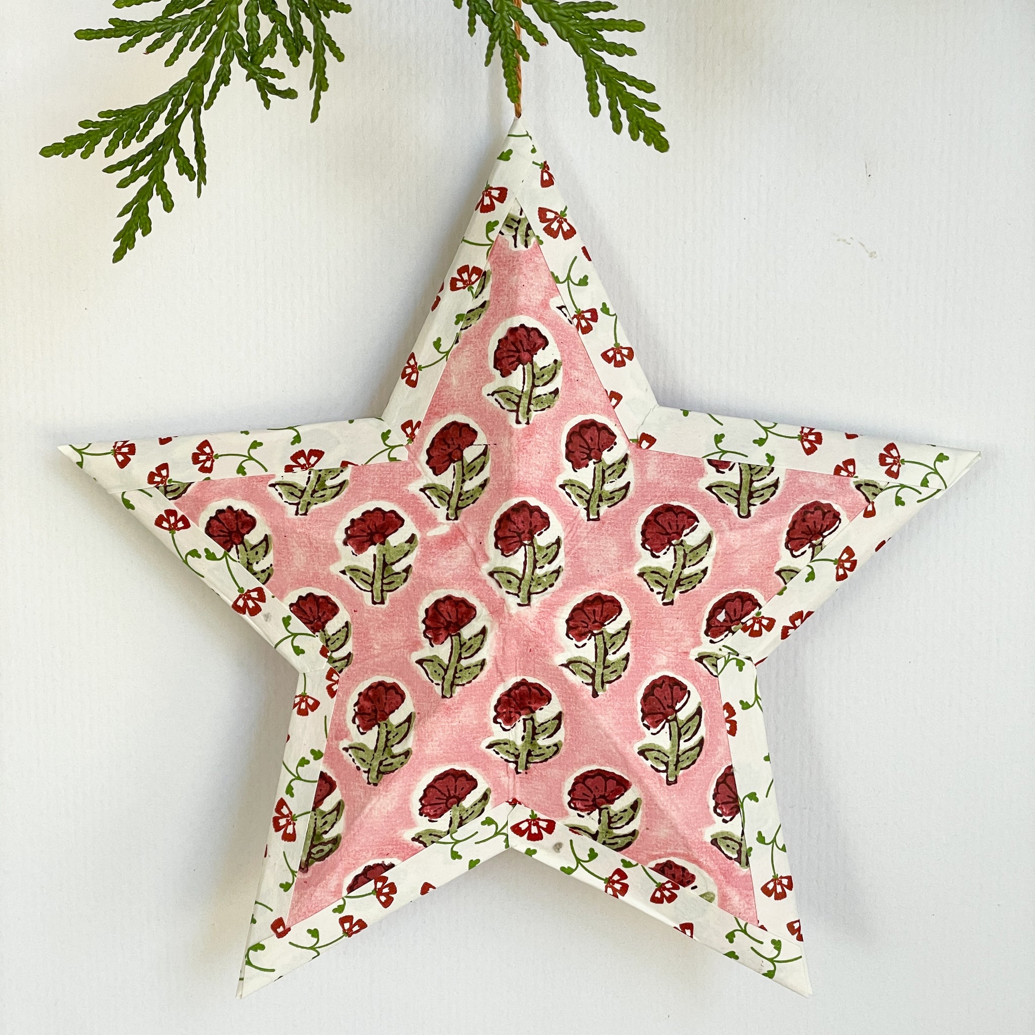 Hanging star in pink block print/red tiny print