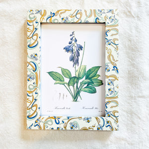 Small standing photo/botanical frame in blues/golds