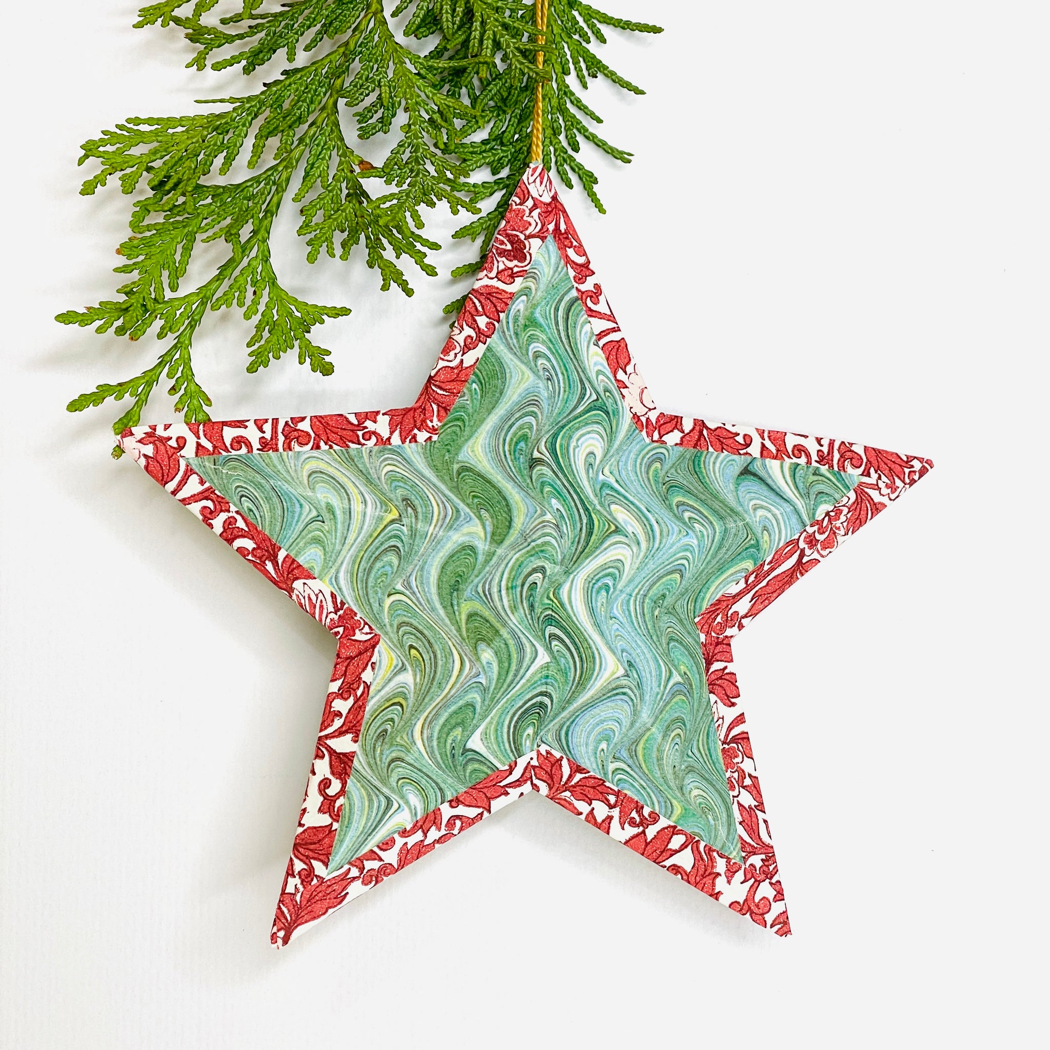 Hanging star in green marble/red floral